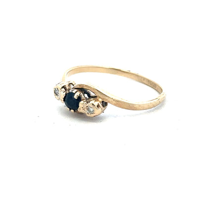 9ct yellow gold sapphire and diamond ring in size Q, featuring a polished band with sparkling gemstones.