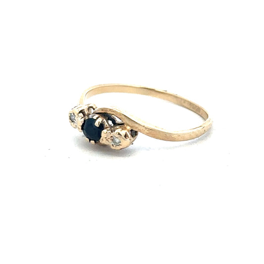9ct yellow gold sapphire and diamond ring in size Q, featuring a polished band with sparkling gemstones.