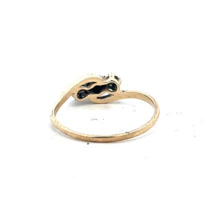 9ct yellow gold sapphire and diamond ring in size Q, featuring a central sapphire with surrounding diamonds.