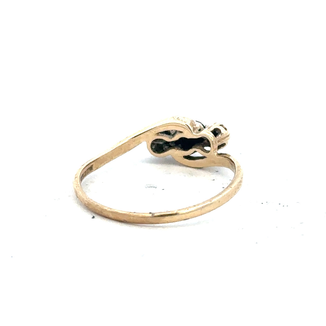 9ct yellow gold sapphire and diamond ring, size Q, featuring a central sapphire gemstone surrounded by diamonds.