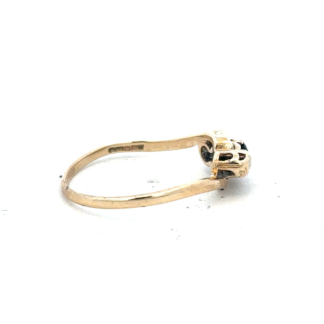 9ct yellow gold sapphire and diamond ring in size Q, featuring a detailed close-up of the elegant jewelry design.