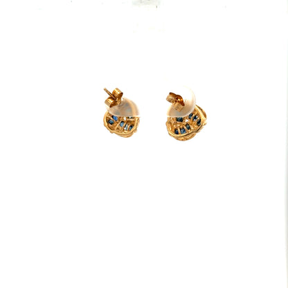 9ct yellow gold sapphire earrings with stud design, featuring blue sapphires set in gold, weighing 2.4g.