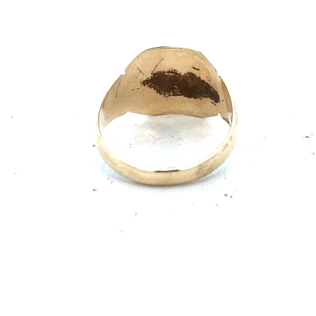 9ct yellow gold signet ring in size J with a smooth polished surface, unbranded jewelry design.