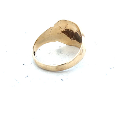 9ct yellow gold signet ring in size J, featuring a smooth polished surface and classic design, unbranded jewelry.
