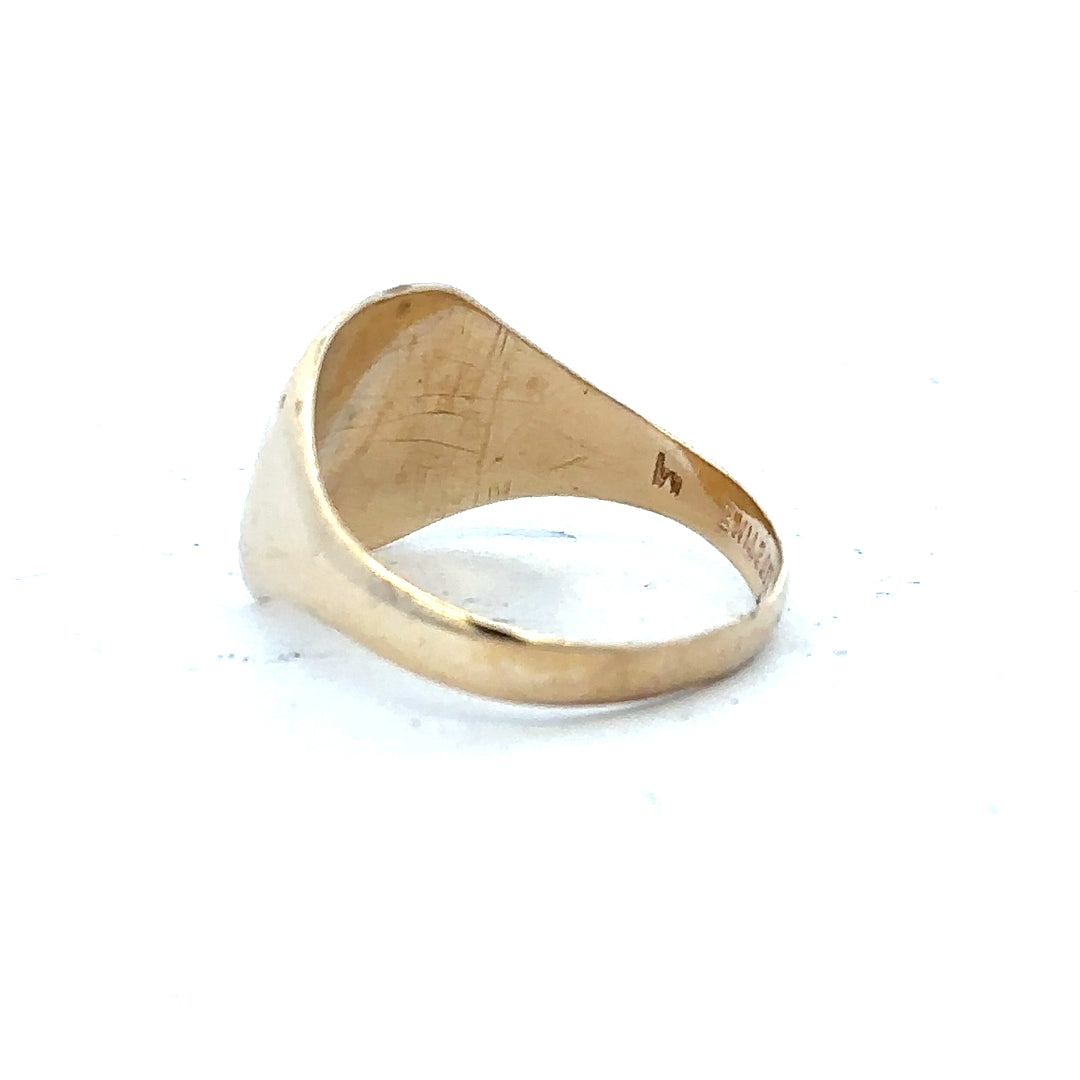9ct yellow gold signet ring in size S, featuring a polished, classic design with a smooth surface and rounded edges.