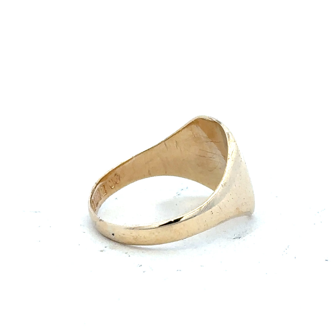 9ct yellow gold signet ring in size S with a smooth polished surface, unbranded jewelry accessory.