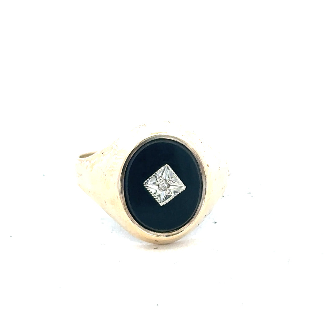 9ct yellow gold signet ring in size T with a smooth, polished surface, unbranded jewelry, close-up view of the ring.