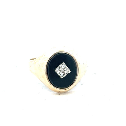 9ct yellow gold signet ring in size T with a smooth, polished surface, unbranded jewelry, close-up view of the ring.