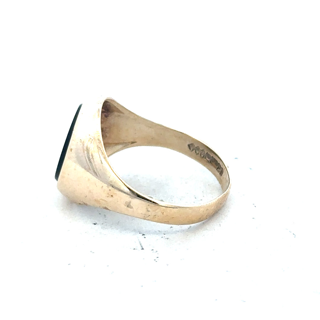 9ct yellow gold signet ring in size T with a smooth polished surface, unbranded jewelry piece.