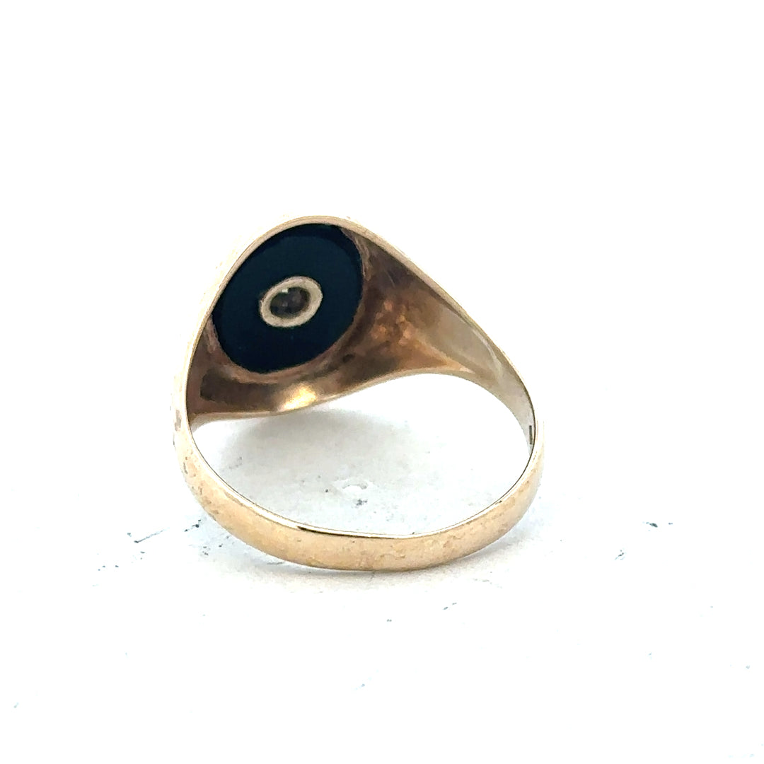 9ct yellow gold signet ring in size T with smooth polished surface, unbranded jewelry design.