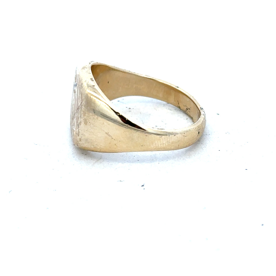 9ct yellow gold signet ring in size T1/2, showing the polished gold surface and classic design.