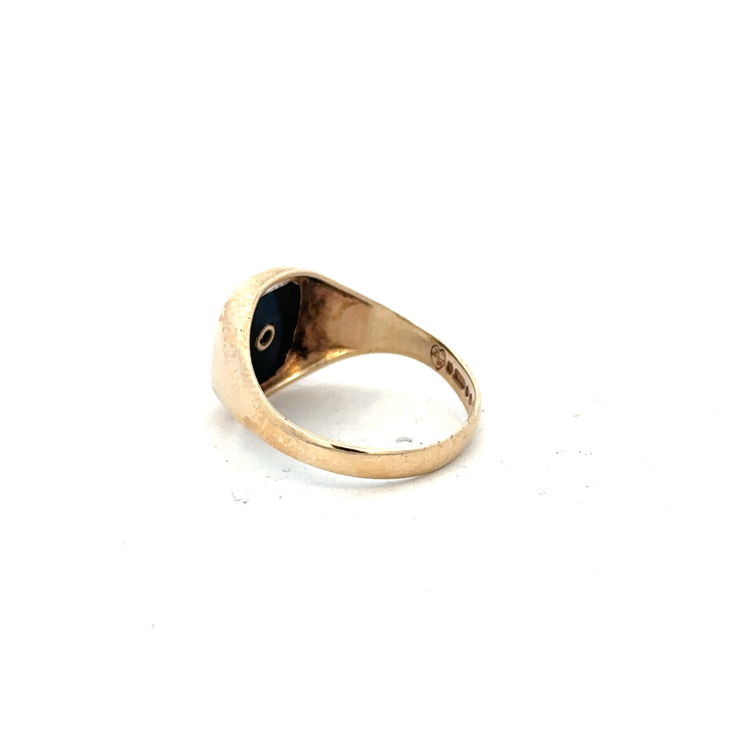 9ct yellow gold signet ring in size X with a smooth, polished surface, unbranded jewelry piece.