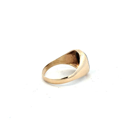 9ct yellow gold signet ring in size X with a smooth, polished finish, unbranded, featuring a classic design.