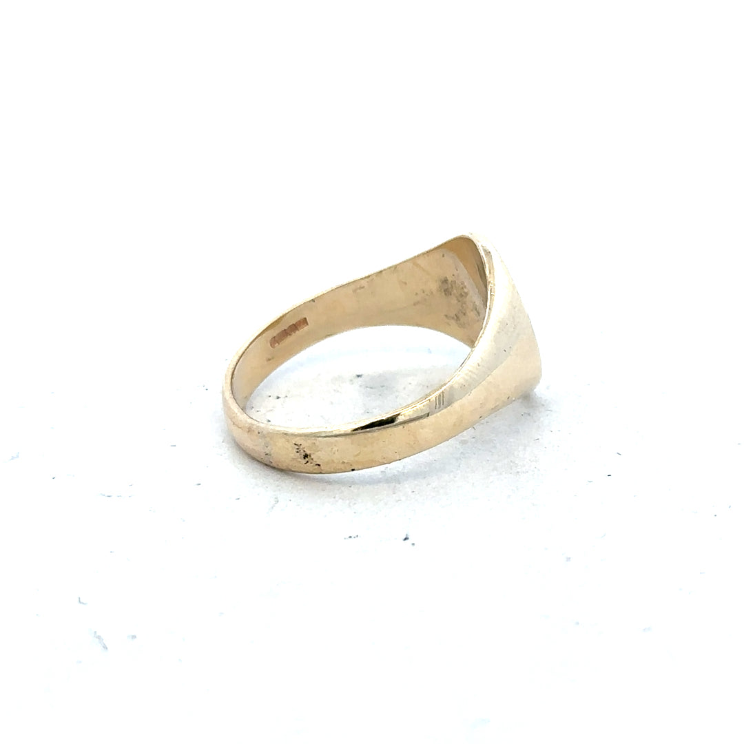 9ct yellow gold signet ring in size X1/2, featuring a smooth polished surface and classic design.