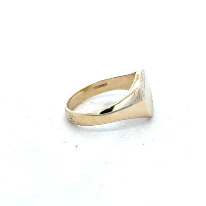9ct yellow gold signet ring in size X1/2, featuring a smooth polished surface and classic design.