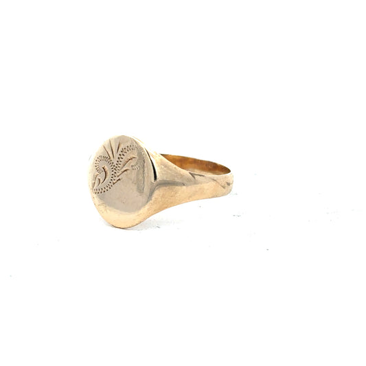 9ct yellow gold signet ring in size Y, featuring a smooth, polished surface and classic design.