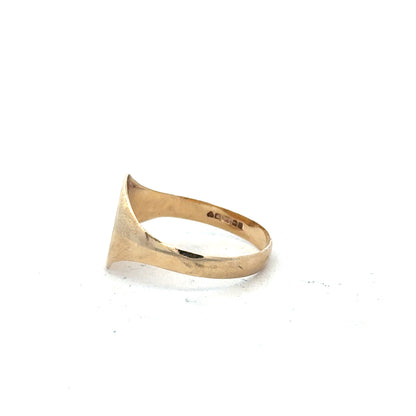 9ct yellow gold signet ring in size Y with a smooth, polished surface, showcasing classic jewelry design.