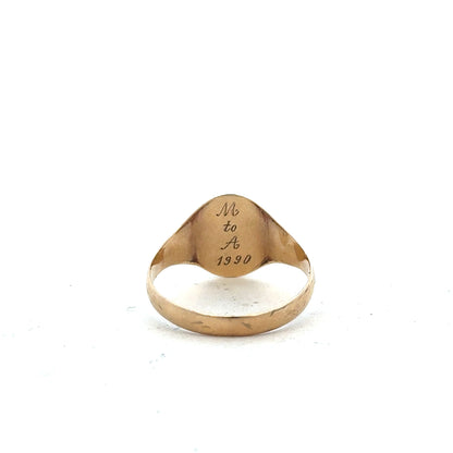 9ct yellow gold signet ring in size Y, featuring a smooth polished surface, unbranded jewelry accessory.