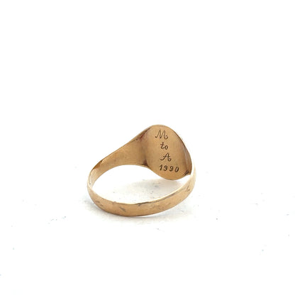 9ct yellow gold signet ring in size Y, unbranded, with a smooth polished surface and classic design.