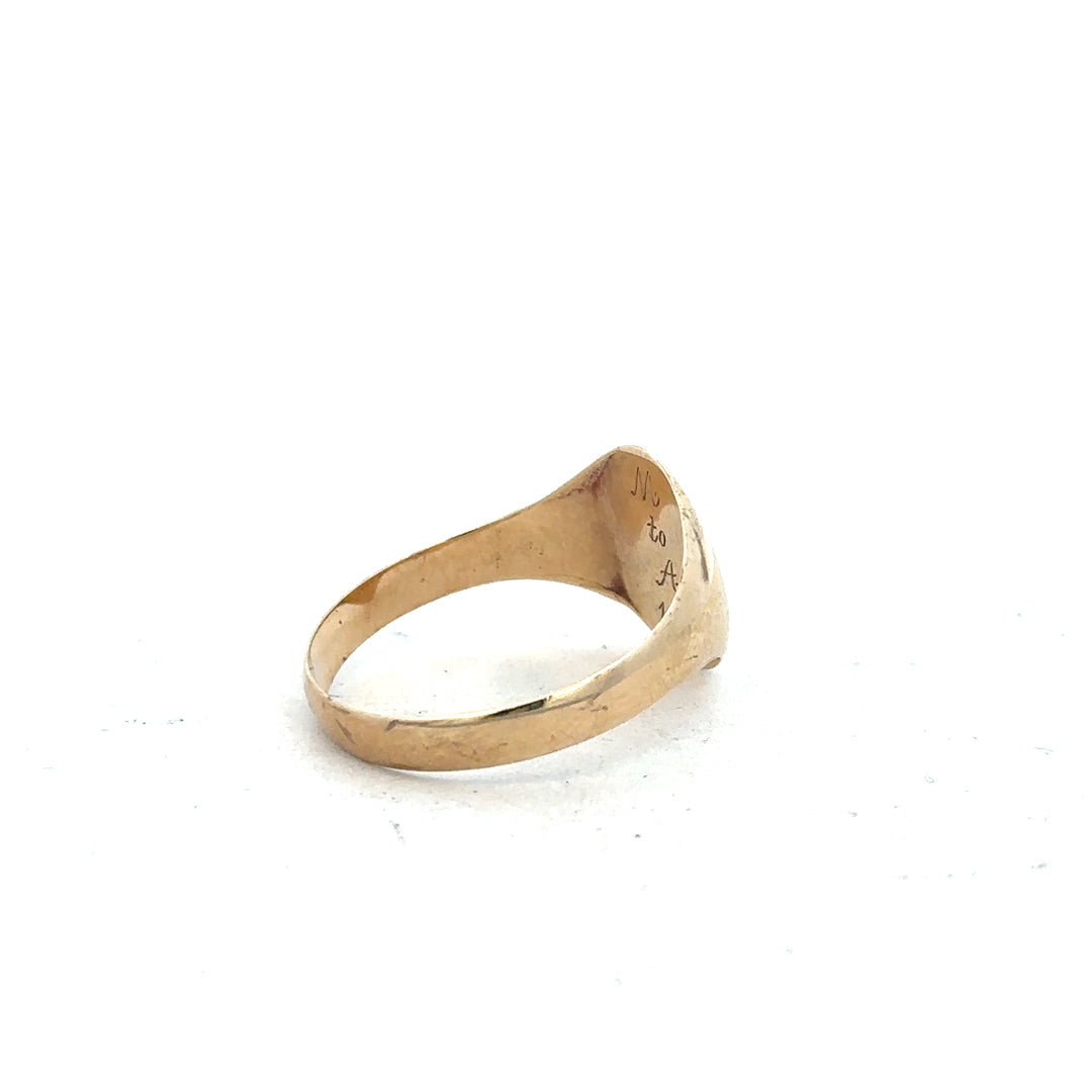 9ct yellow gold signet ring in size Y with a smooth, polished surface and classic design, unbranded jewelry accessory.
