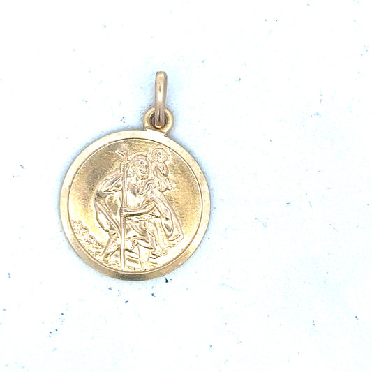 9ct yellow gold St Christopher pendant weighing 3.1g, unbranded jewelry with detailed religious pendant design.