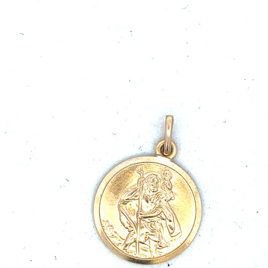 9ct yellow gold St. Christopher pendant weighing 3.1g, unbranded, featuring detailed religious medal design.