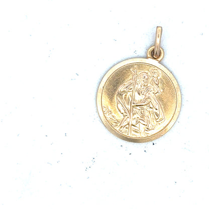 9ct yellow gold St Christopher pendant weighing 3.1g, unbranded jewelry with detailed religious pendant design.