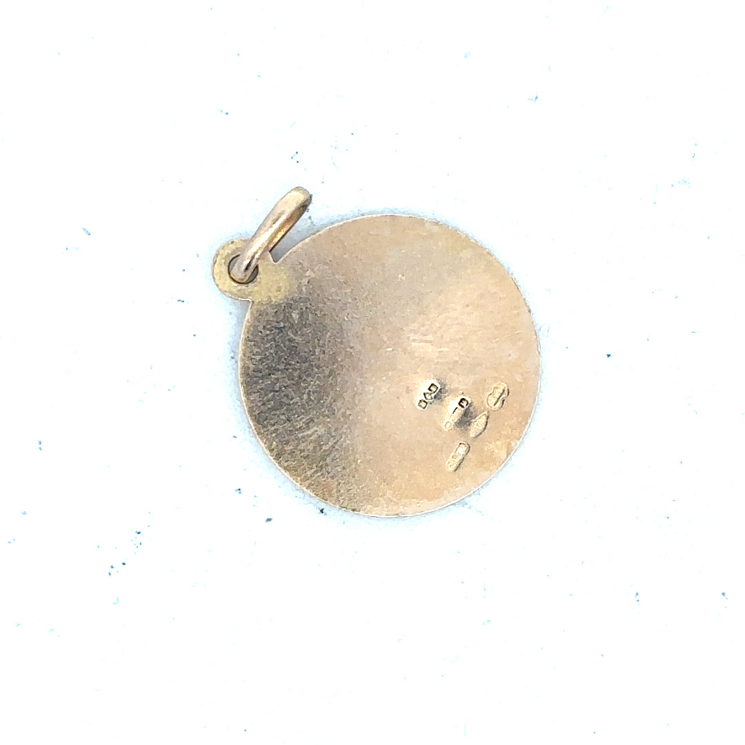 9ct yellow gold St Christopher pendant weighing 3.1g, unbranded, with detailed religious charm design visible in the image.