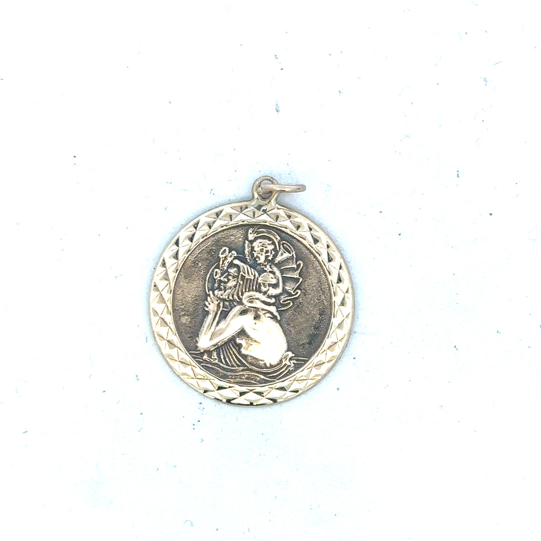 9ct yellow gold St Christopher pendant weighing 4.9g, unbranded jewelry with detailed religious medal design.