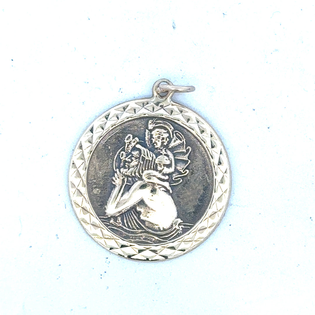 9ct yellow gold St Christopher pendant weighing 4.9g, unbranded jewelry with detailed religious medal design.