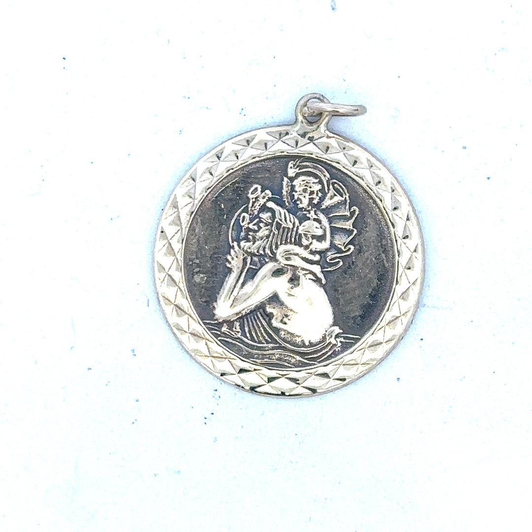 9ct yellow gold St Christopher pendant, unbranded, weighing 4.9g, displayed with detailed engraving and polished finish.
