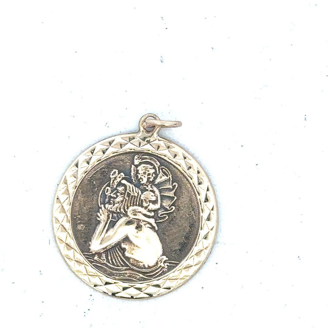 9ct yellow gold St Christopher pendant weighing 4.9g, unbranded jewelry piece with detailed religious design on a chain.