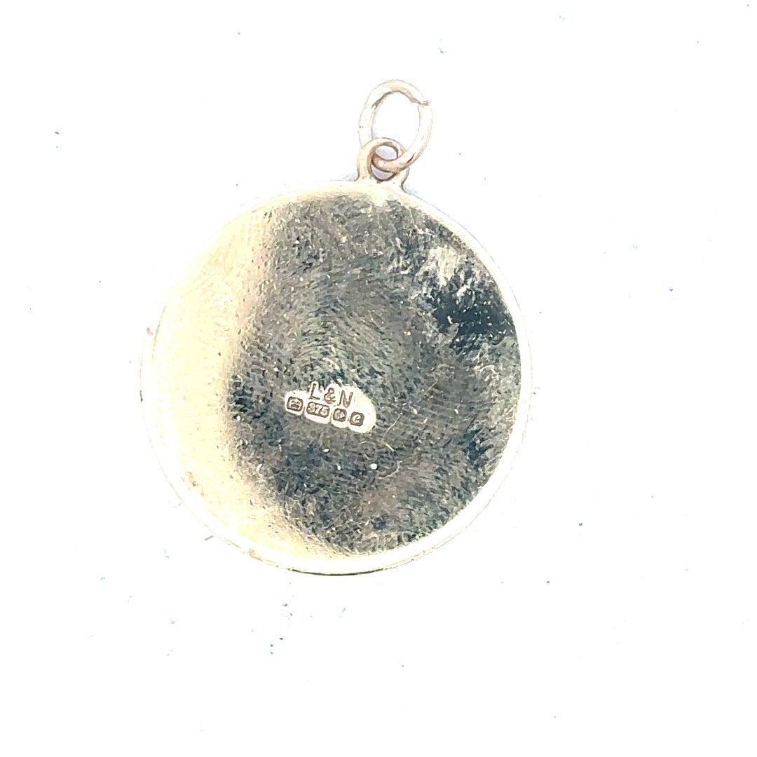 9ct yellow gold St Christopher pendant, unbranded, weighing 4.9g, featuring detailed religious medal design.