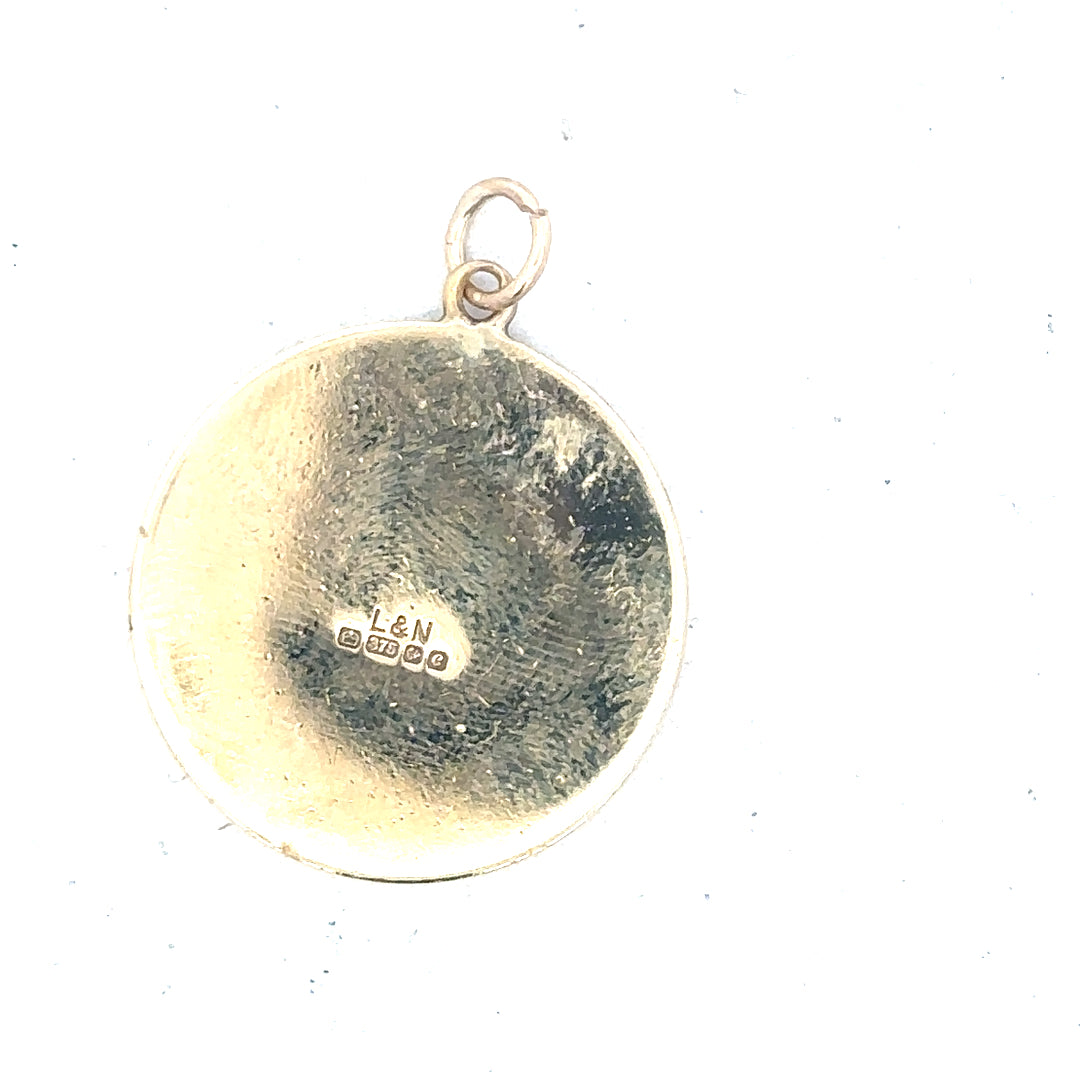 9ct yellow gold St Christopher pendant weighing 4.9g, unbranded, with detailed religious medal design on a chain.