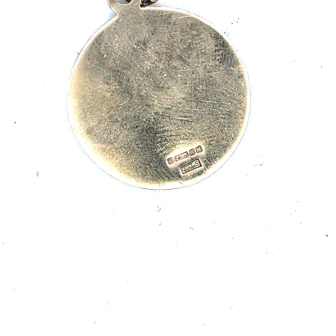 9ct yellow gold St. Christopher pendant, 5.7g, unbranded, featuring detailed religious iconography on a polished gold surface.