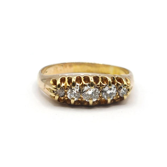 Antique 18ct yellow gold diamond ring featuring five old-cut diamonds totaling 0.57 carats, showcasing vintage jewelry craftsmanship.