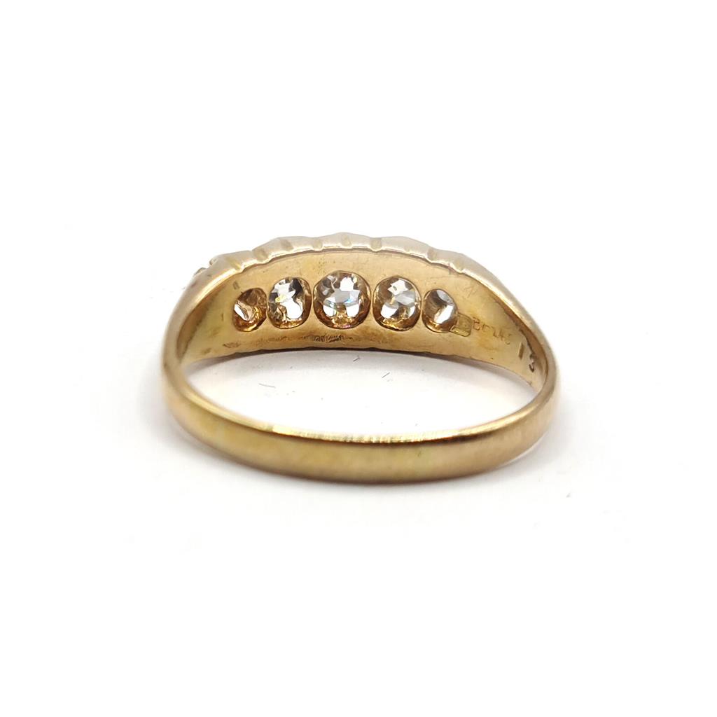 Antique 18ct yellow gold ring with five old-cut diamonds totaling 0.57 carats, featuring vintage craftsmanship and elegant design.