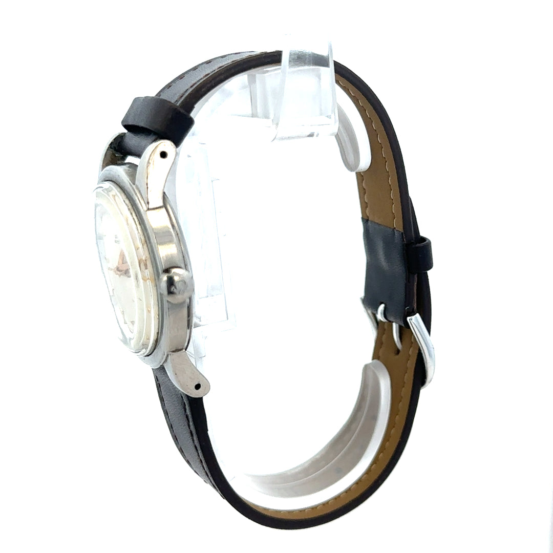 Unbranded Omega bumper automatic watch with silver dial and black leather strap, displayed on a white background.