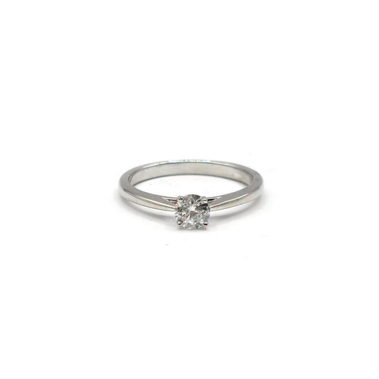 Platinum solitaire ring with a 0.26 carat diamond, featuring a simple and elegant design.