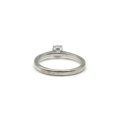 Platinum 0.26 carat diamond solitaire ring with a single sparkling diamond set on a sleek band.