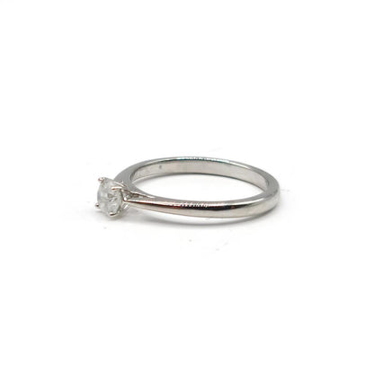 Platinum 0.26 carat diamond solitaire ring featuring a single sparkling diamond set on a sleek platinum band.