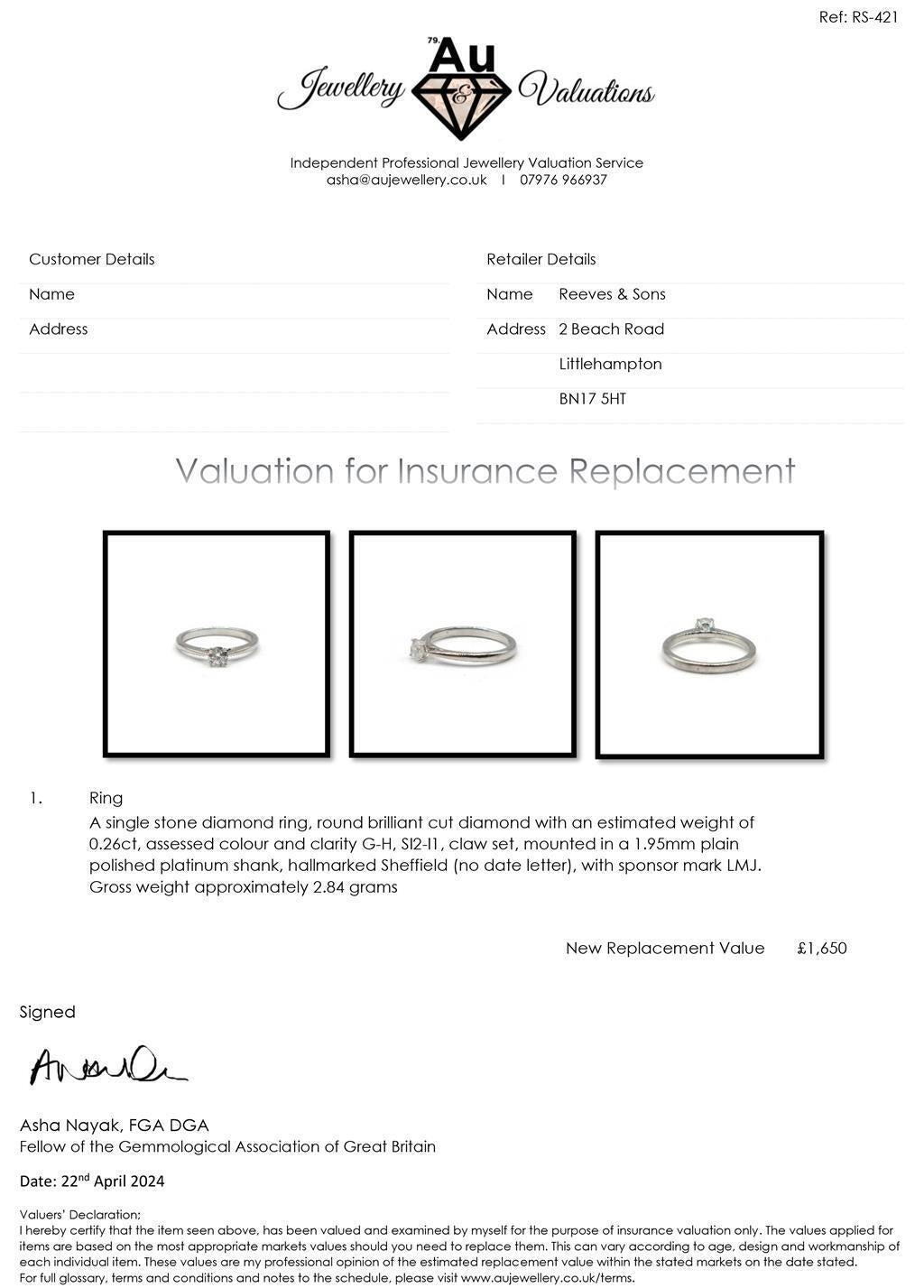 Platinum diamond solitaire ring with a 0.26 carat round-cut diamond on a sleek band