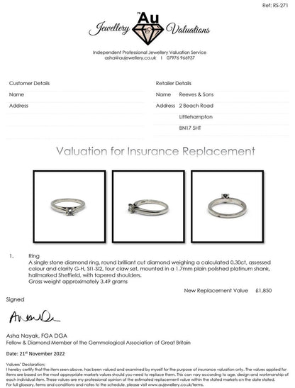 Platinum 0.30 carat solitaire brilliant cut diamond ring with a sleek band and sparkling central diamond.