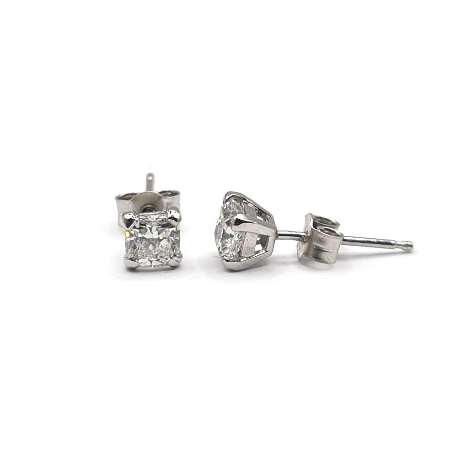 Platinum 1.00 carat GIA Certified diamond stud earrings with color G and clarity VS2, featuring round brilliant-cut diamonds.