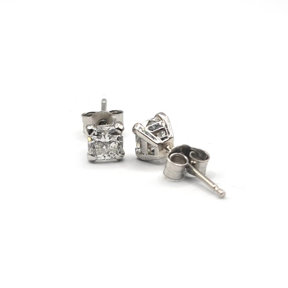 Platinum 1.00 carat GIA Certified diamond stud earrings with Colour G and VS2 clarity, featuring classic round diamonds.