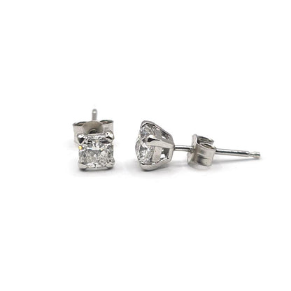 Platinum 1.00 carat GIA certified diamond stud earrings with color G and clarity VS2, featuring classic, elegant design.