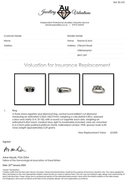 Platinum ring with 1/2 carat diamond and 0.80 carat sapphire, featuring a sleek, elegant design.