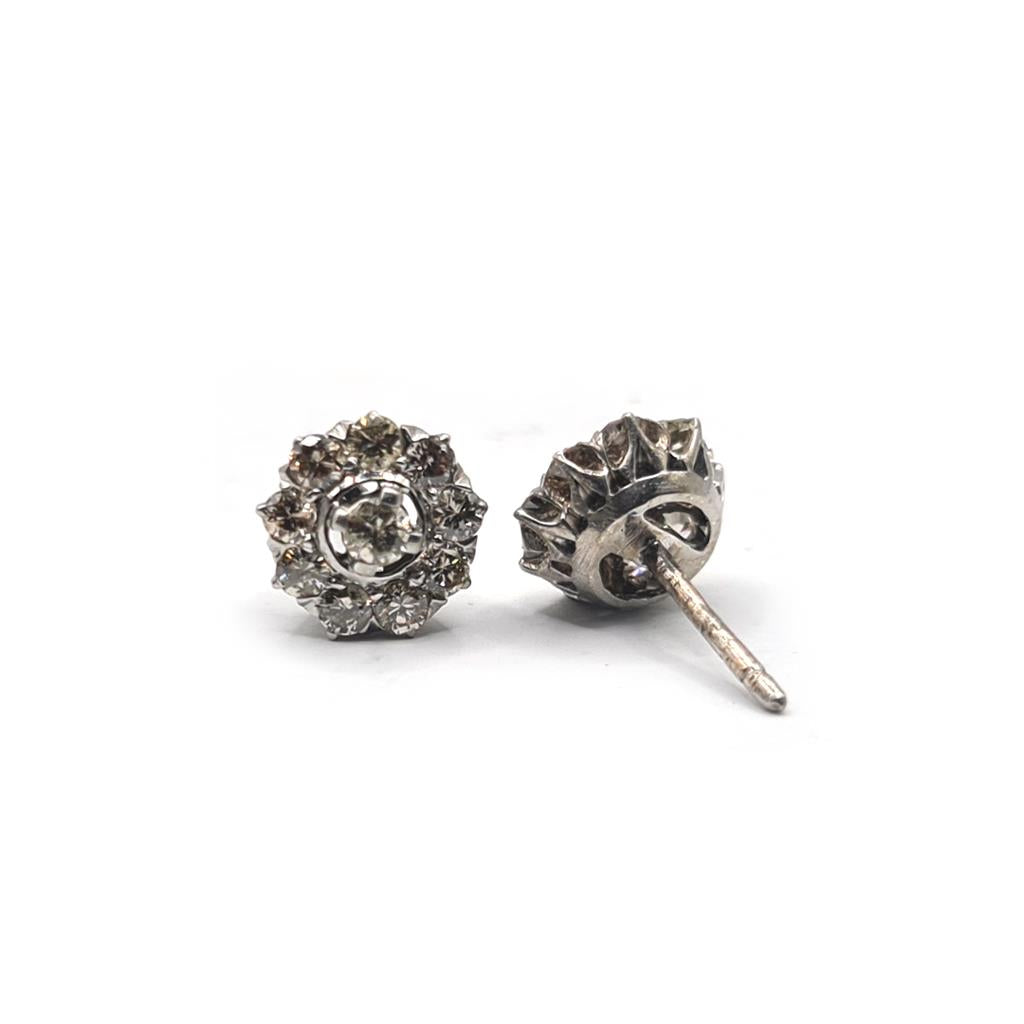 Platinum 1.40 carat diamond stud earrings featuring round-cut diamonds and a secure stud setting.
