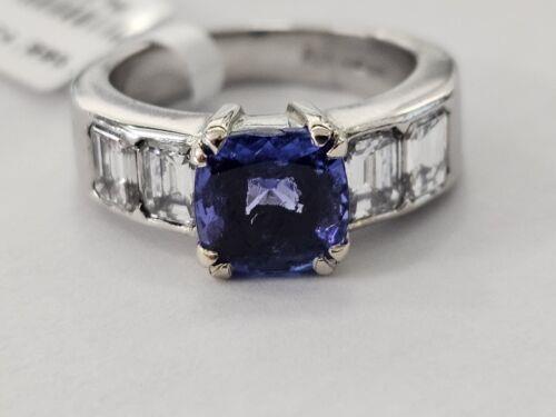 Platinum ring featuring a 1.79 carat tanzanite gemstone and 1.60 carat diamonds, elegant jewelry piece with detailed setting.