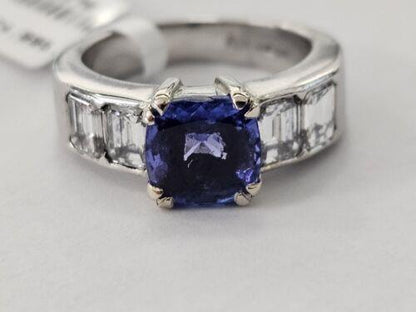 Platinum ring featuring a 1.79 carat tanzanite gemstone and 1.60 carat diamonds, elegant jewelry piece with detailed setting.